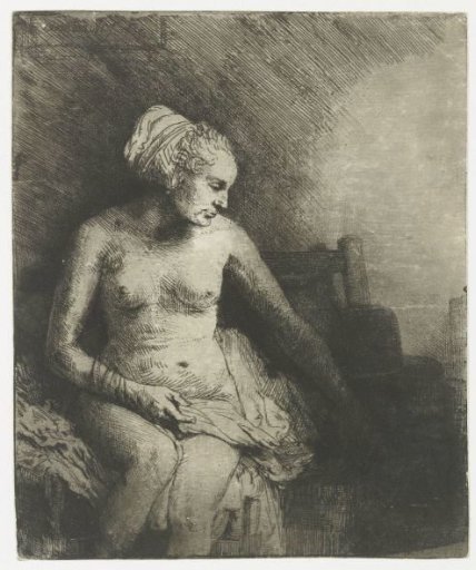 Woman bathing with a hat beside her