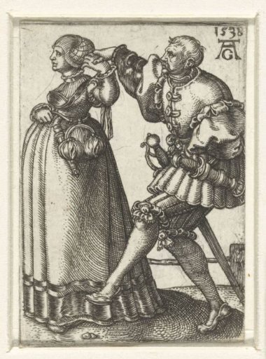 Dancing couple with arms raised