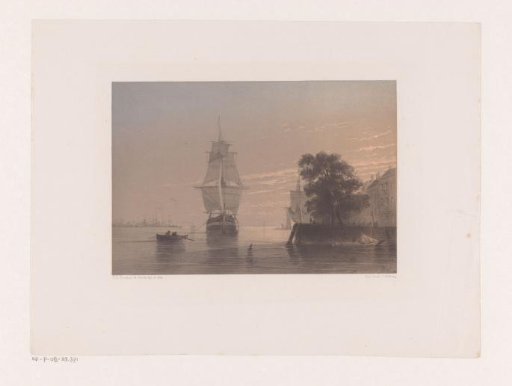 Sailing ships at a quay at sunset