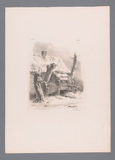 Snow-covered farm shed