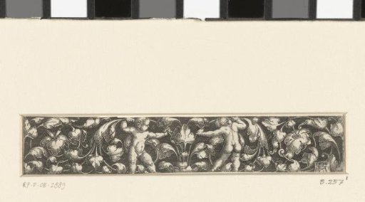 Frieze with two children between leafy scrolls