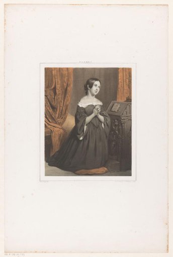 Kneeling woman in prayer
