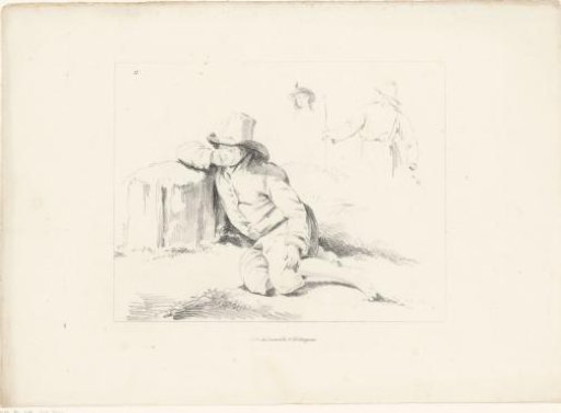Young Man with Hat Sitting on the Ground