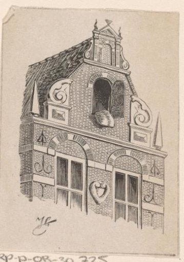 House with bedding hanging from the window