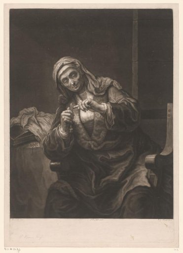 Seated old woman cutting her nails