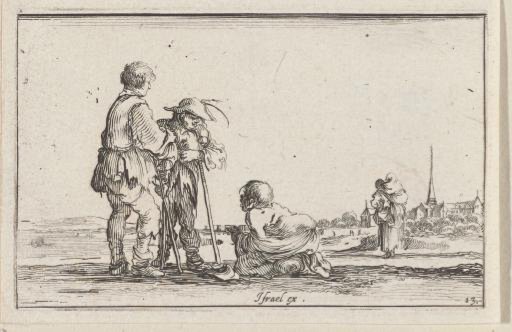 Two standing men talking to a crouching man