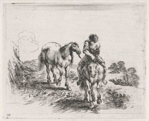 Man on horseback leading another horse