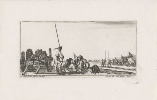 Soldiers playing cards beside a cannon