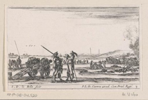 Two soldiers in conversation by a cannon