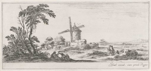 Windmill in a flat landscape