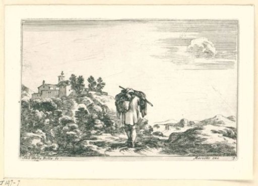 Man with a pack in a landscape