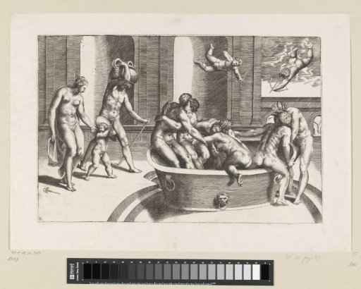 Men and women in a large bath tub
