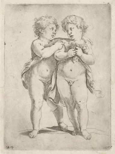 Two boys, one with a bunch of grapes