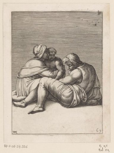 Man sitting on the ground with woman and child