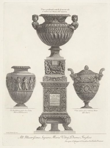 Three vases, one on a pedestal