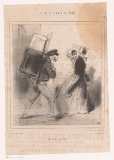 Worker carries things for two ladies