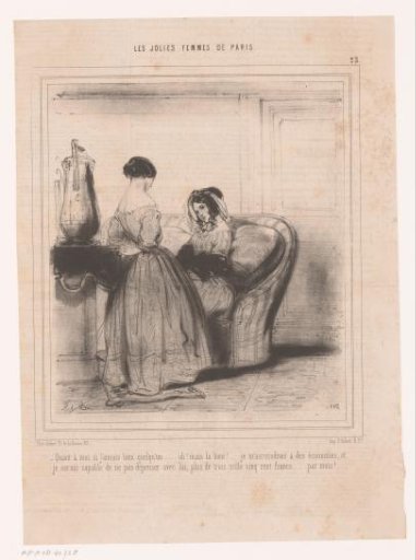 Two women indoors talking to each other