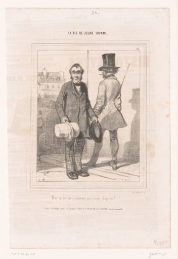 Young man passing a hatter on the street