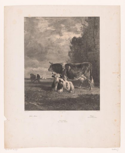Three cows and a farmer in a meadow