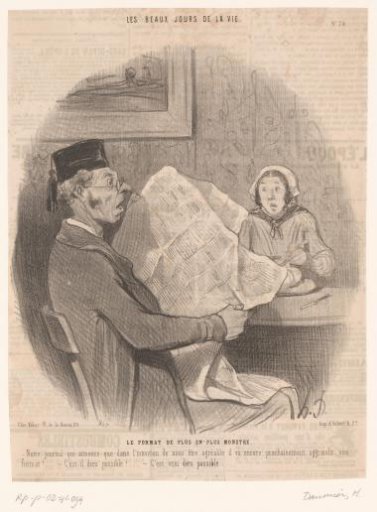 Couple with a large-format newspaper