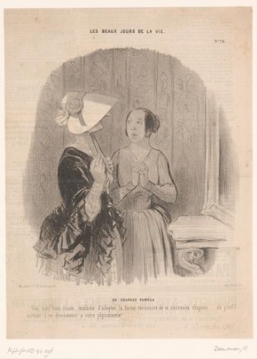 Saleswoman praising a hat to a customer