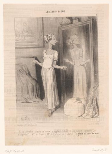 Woman trying on a dress in front of the mirror