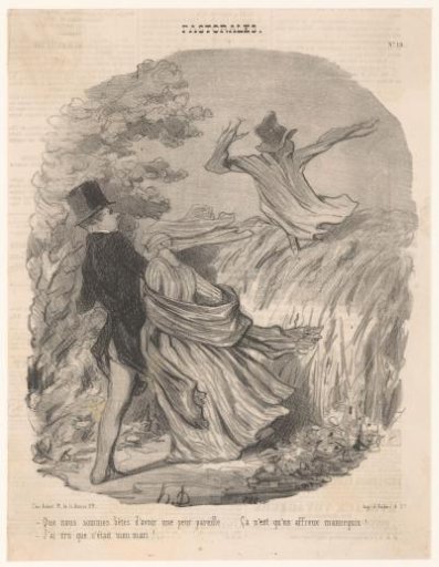 Couple by a field with a scarecrow