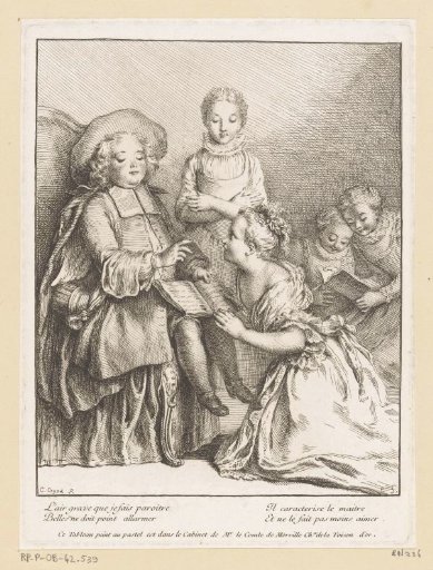 Group of children with a boy seated on a chair and a girl kneeling before him