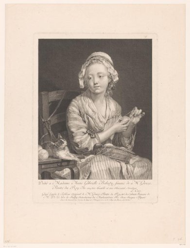 Girl with a ball of wool and a cat