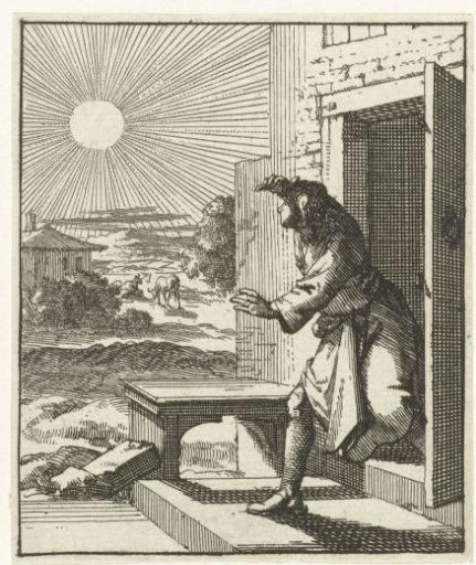 Man shielding his eyes from the sun as he walks outside