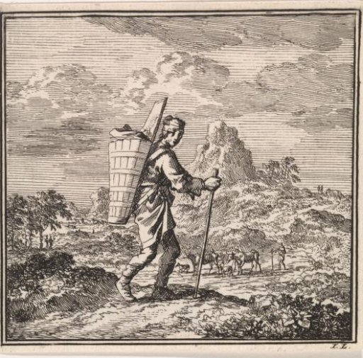 Hiker with a staff and carrying basket in a hilly landscape