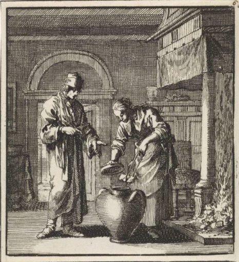 A woman putting a glowing coal into the snuffer pot