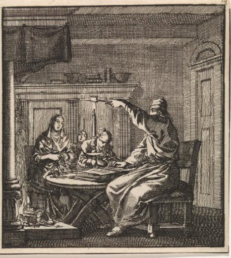 A man extinguishing a candle with a candle snuffer