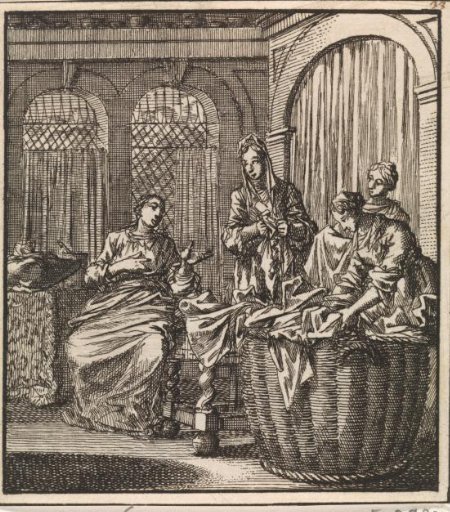 Four women by a laundry basket