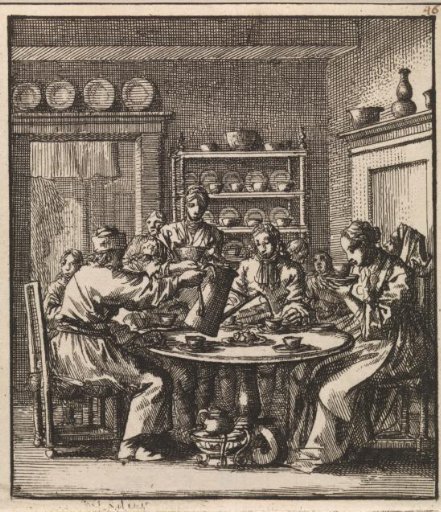 A group drinking coffee at a table