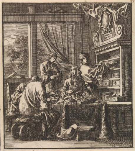 Five men examining the contents of various drawers from a cabinet