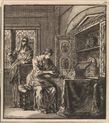 Woman examining the contents of a small chest of valuables