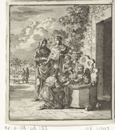 Two Children Playing with a Small Child in a Play Chair