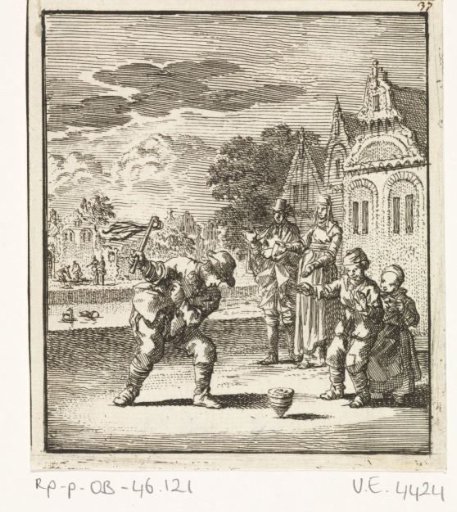 Children playing with a spinning top