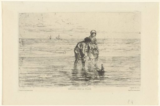 Children playing with a small boat on the beach