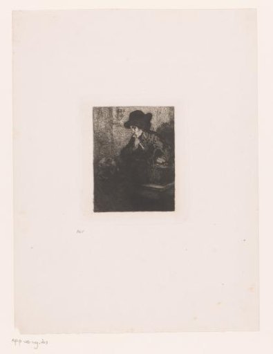 Young man gnawing a bone while being watched by a dog