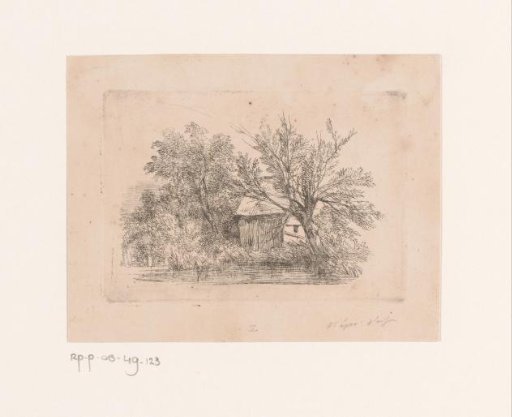 Small building among trees by the water