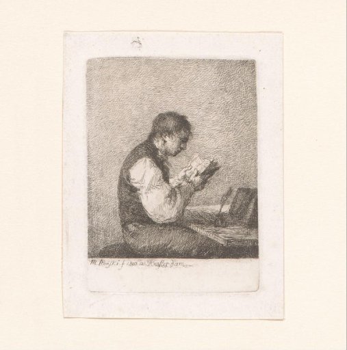 Man reading at a desk