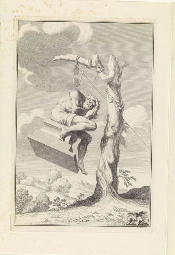 Statue of a man hanging from a pulley in a tree