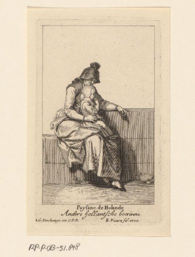 Holland peasant woman with her small child on her lap