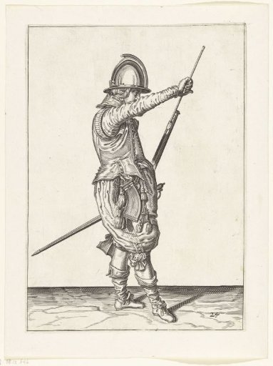 Soldier taking his ramrod from the holder under the barrel of his musket