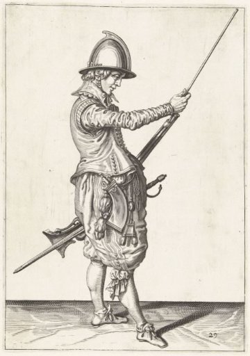 Soldier sliding his ramrod into the holder under the barrel of his musket