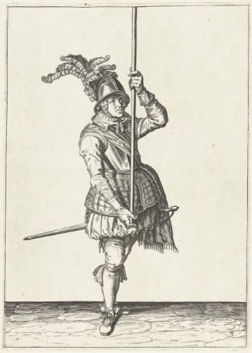 Soldier holding his pike upright in front of him with both hands high above the ground