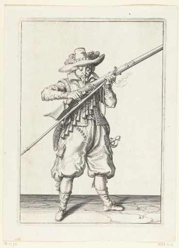 Soldier blowing powder from his musket