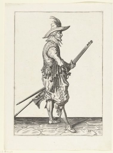Soldier holding his musket with both hands near his left thigh
